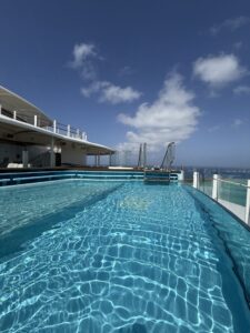 Adult pool aboard the Disney Wish overlooking Castaway Cay